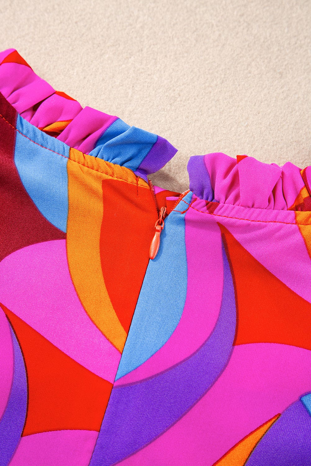 Orange Abstract Print Peplum Blouse with Flutter Sleeves