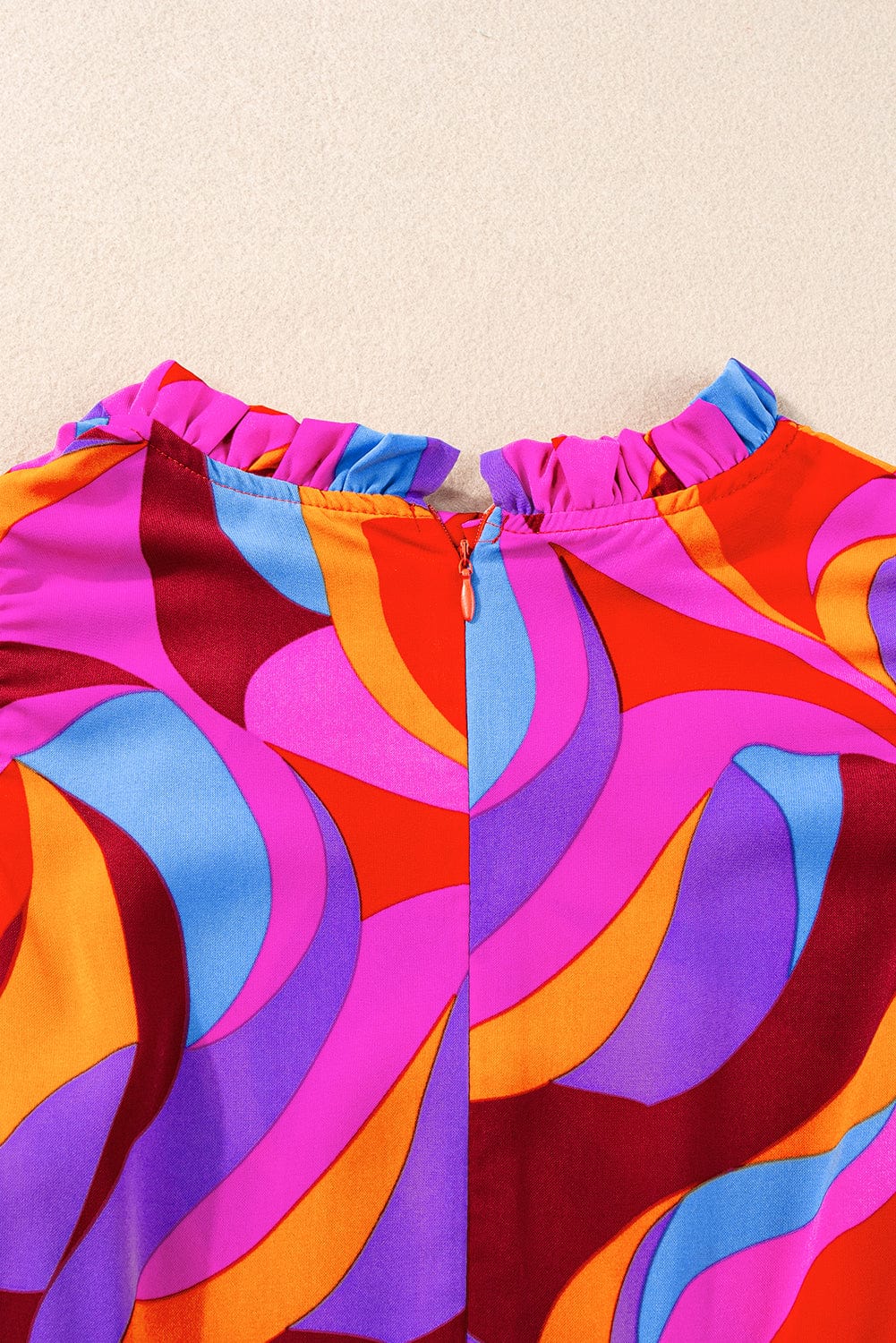 Orange Abstract Print Peplum Blouse with Flutter Sleeves