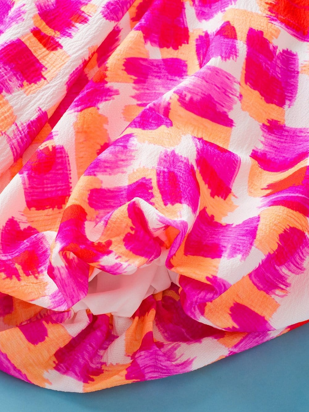 Pink Abstract Print Ruffled High Neck Blouse with Button Back