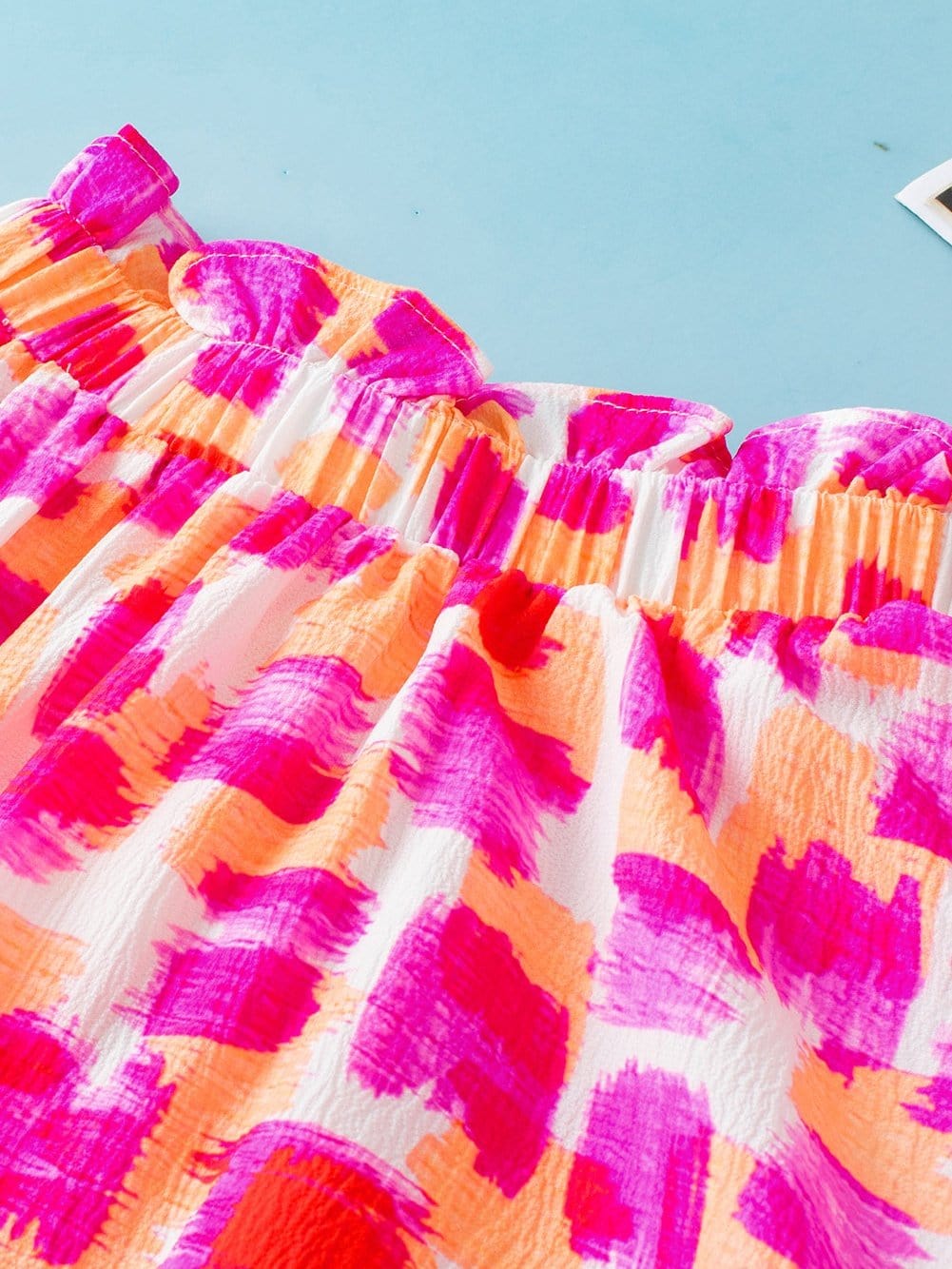 Pink Abstract Print Ruffled High Neck Blouse with Button Back