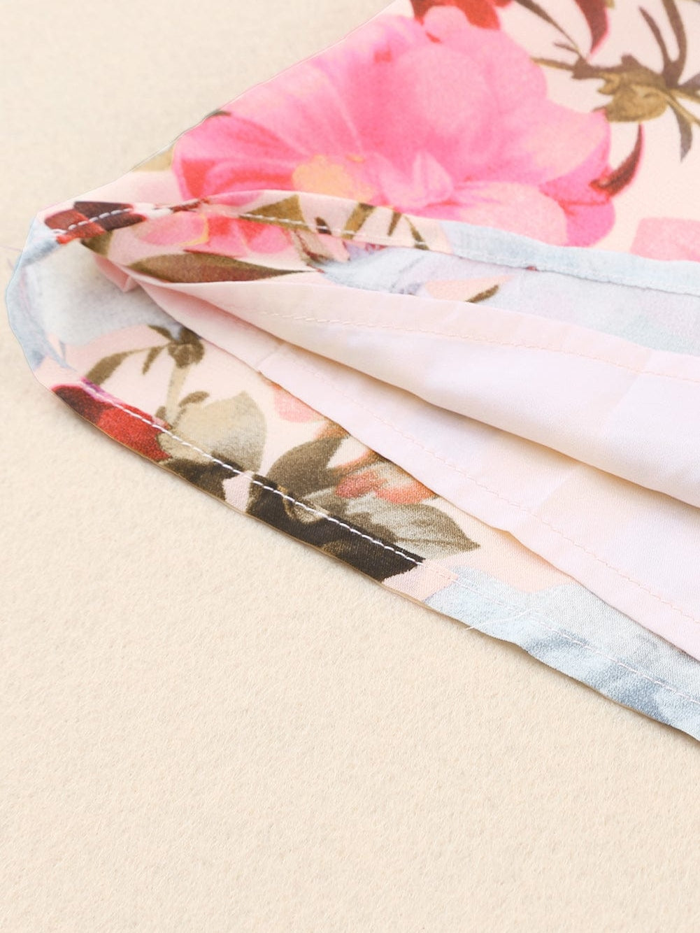 Pink Floral Ruffle Sleeve V-Neck Blouse with Tassel Detail