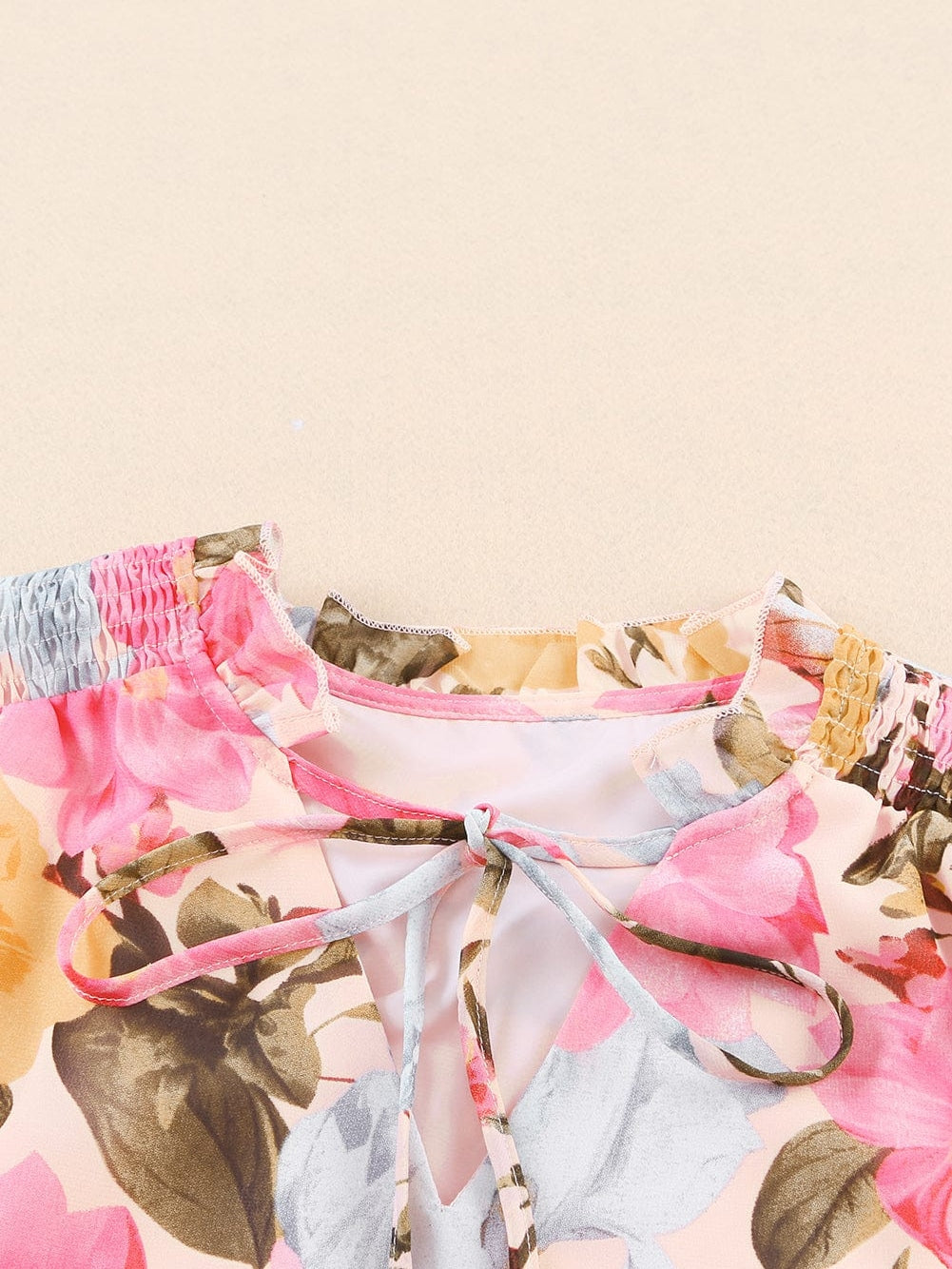 Pink Floral Ruffle Sleeve V-Neck Blouse with Tassel Detail