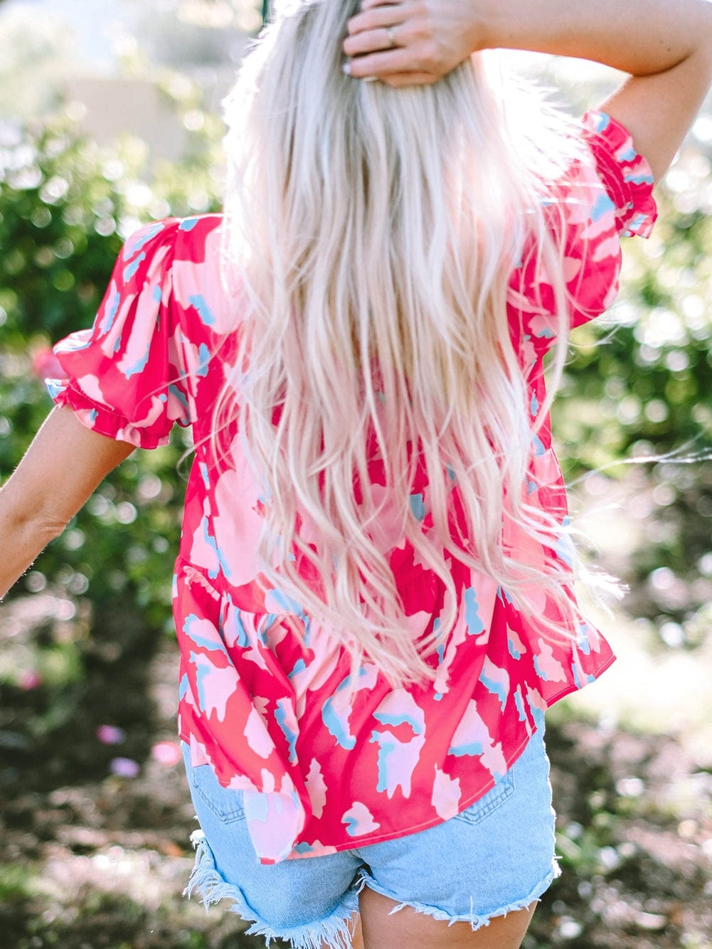 Rose Abstract Print Ruffle Hem V Neck Blouse