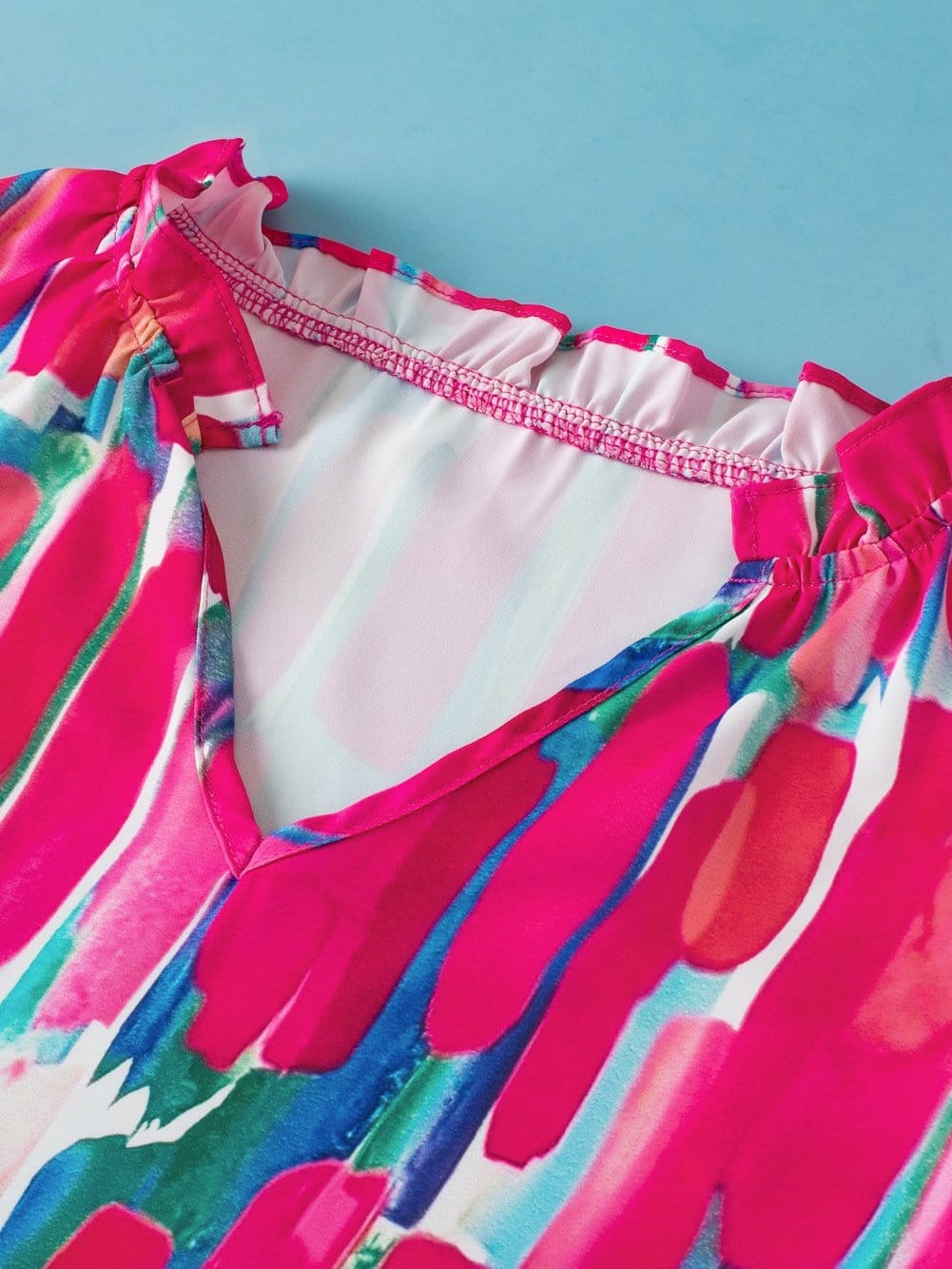 Rose Brush Print Ruffle Sleeve V-Neck Blouse with Abstract Design