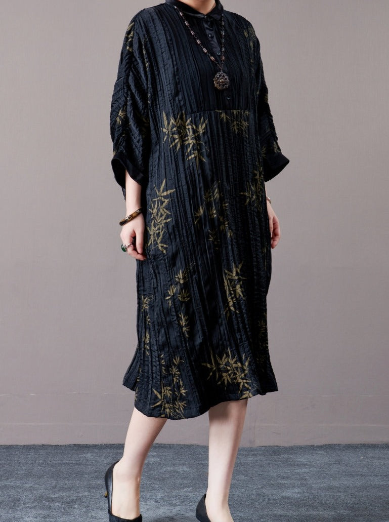 Elegant Black Pleated Maxi Dress with Golden Bamboo Motif