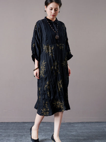 Elegant Black Pleated Maxi Dress with Golden Bamboo Motif