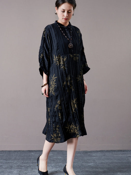 Elegant Black Pleated Maxi Dress with Golden Bamboo Motif