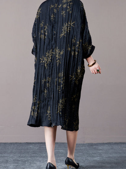 Elegant Black Pleated Maxi Dress with Golden Bamboo Motif