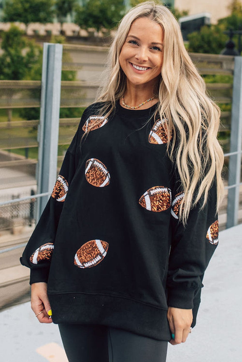 Shimmering Black Sequin Rugby Graphic Sweater