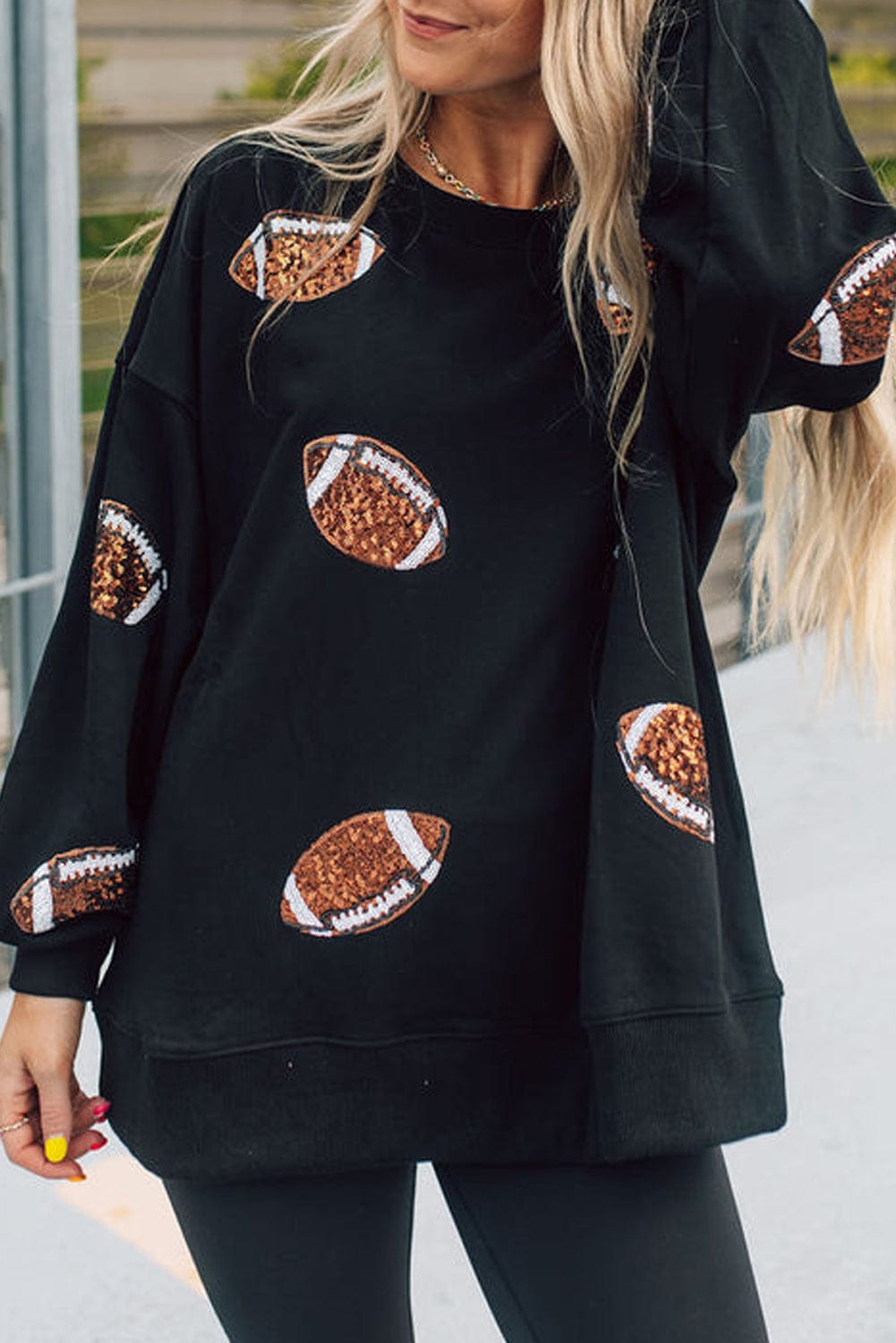 Shimmering Black Sequin Rugby Graphic Sweater