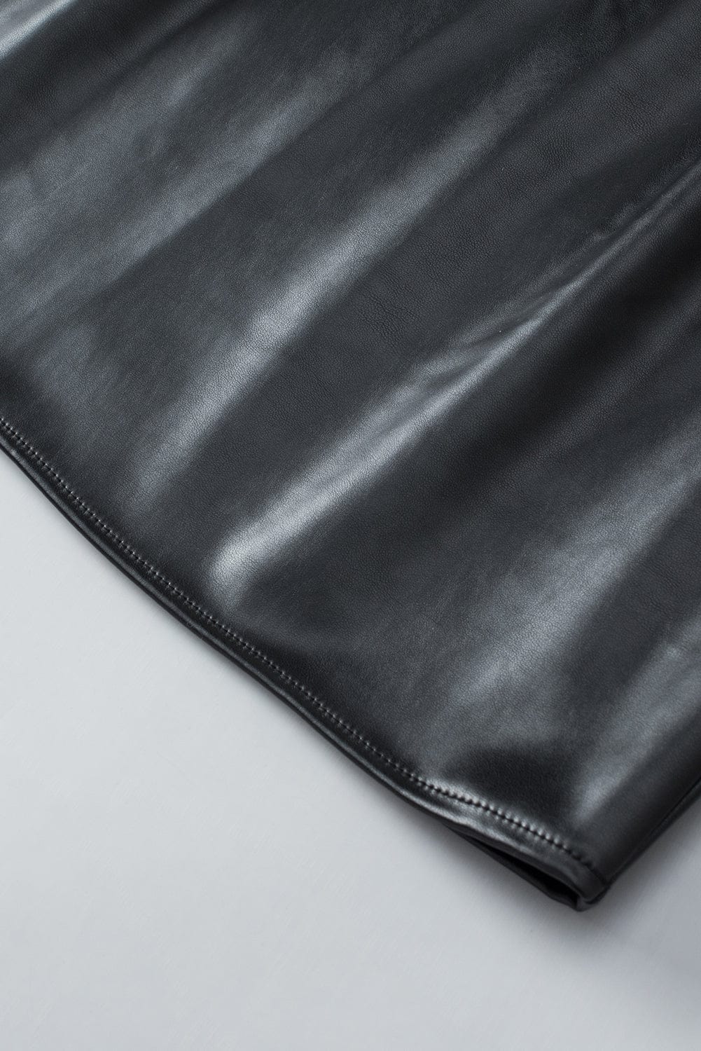 Sleek Black Faux Leather Crew Neck Sleeveless Top