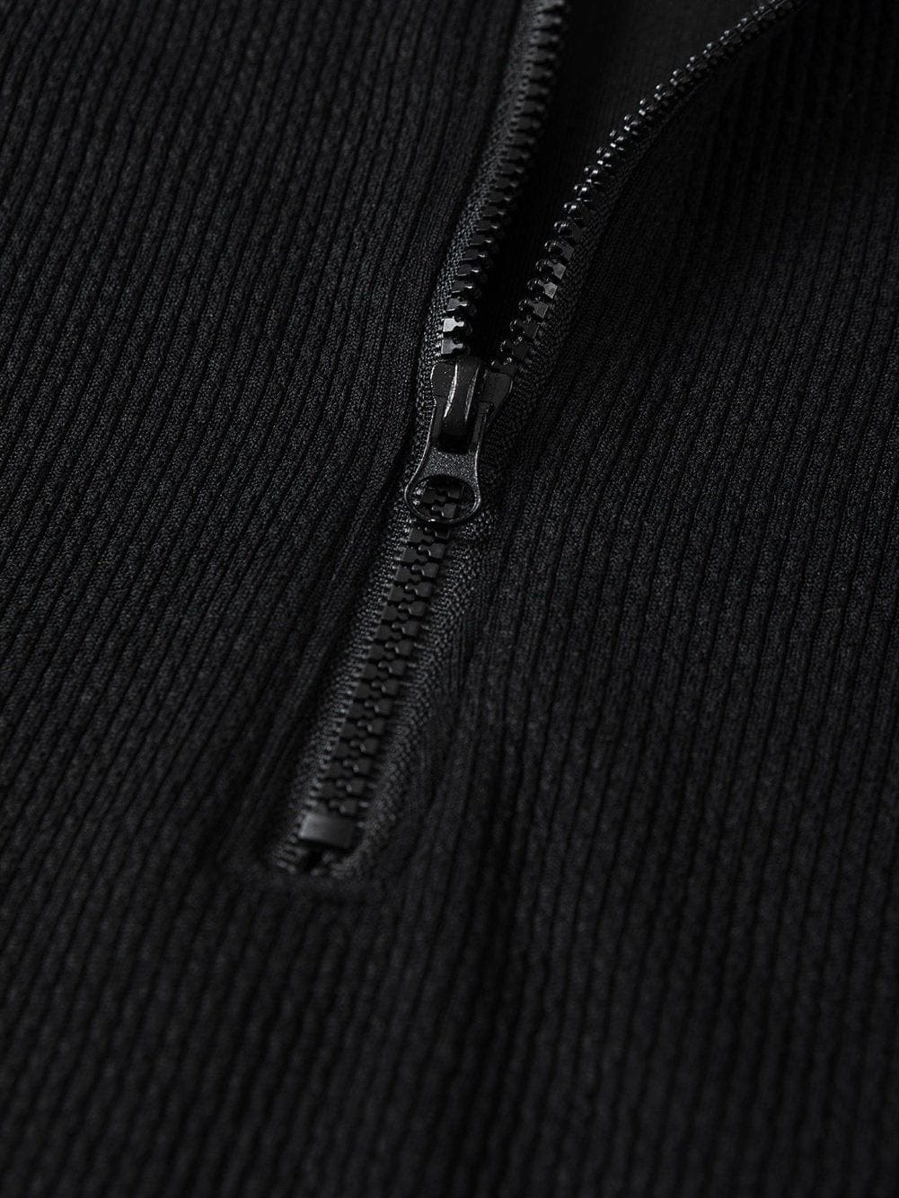 Sleek Black Ribbed Sleeveless Bodysuit with Mock Neck Zip-Up Style