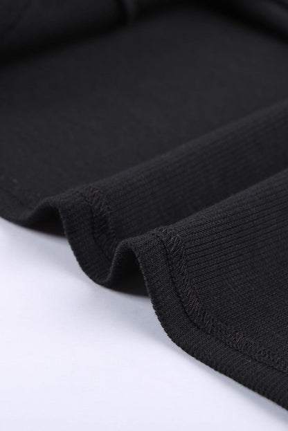 Sleek Black Ribbed Tank Top with Button Detail