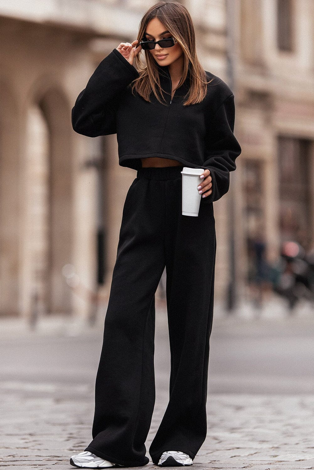 Sleek Black Zippered Collared Top and Wide Leg Pants Ensemble