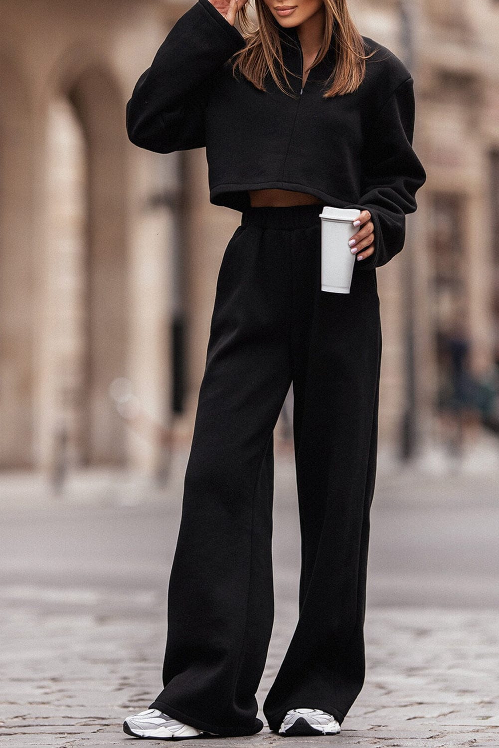 Sleek Black Zippered Collared Top and Wide Leg Pants Ensemble