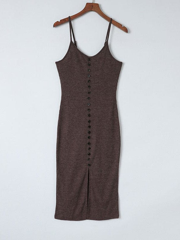 Sleek sexy hip-hugging dress in a solid color with tight knitted skirt featuring a slit-mid design