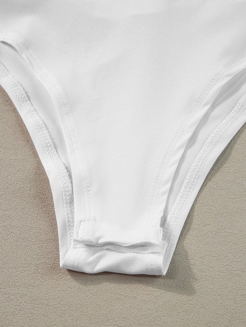 Sleek White Ribbed Zip-Up Mock Neck Bodysuit