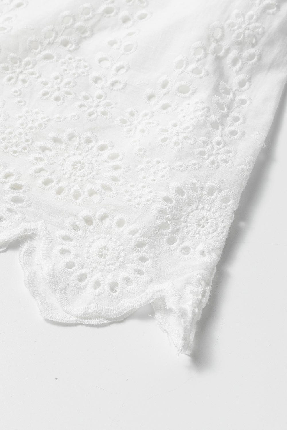 Smocked White Mini Dress with Adjustable Tie Straps