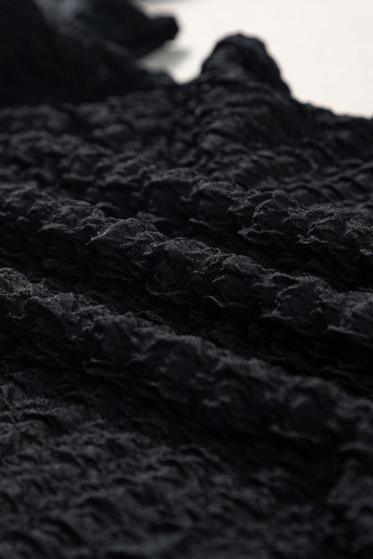 Sophisticated Black Textured Midi Dress with Twist Front Detail