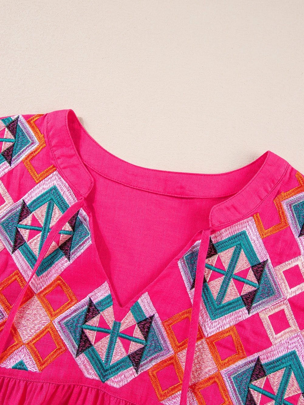 Strawberry Pink Embroidered Geometric Tassel Tie V Neck Top