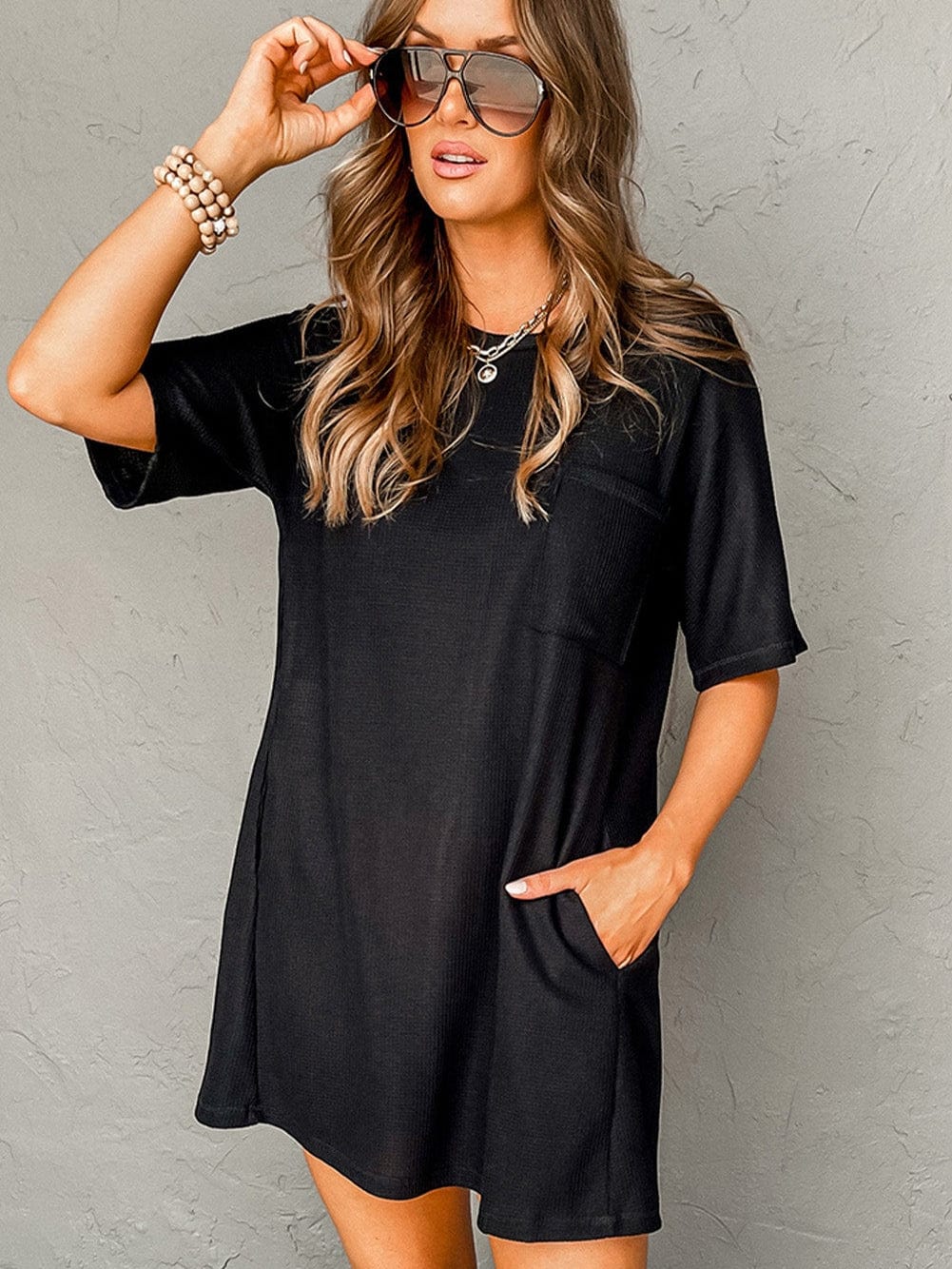 Stylish Black Waffle Knit T-shirt Dress with Chic Pockets