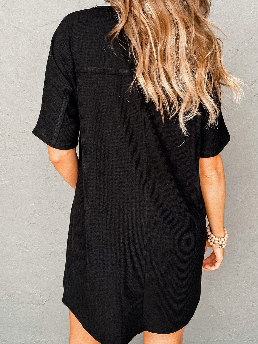 Stylish Black Waffle Knit T-shirt Dress with Chic Pockets