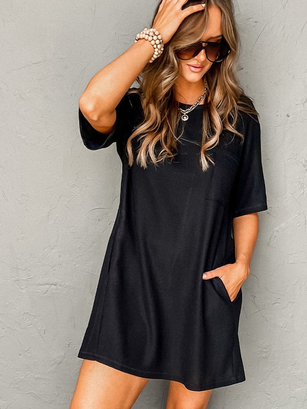Stylish Black Waffle Knit T-shirt Dress with Chic Pockets