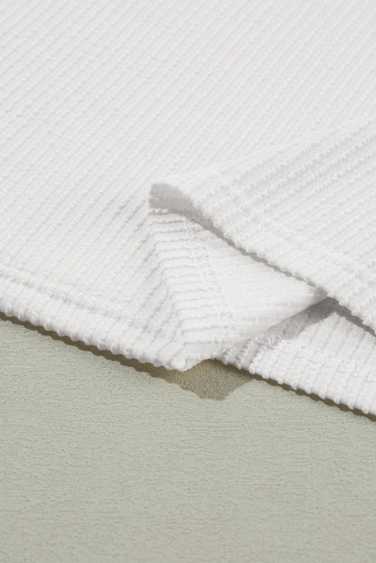 Stylish White Ribbed Knit Top with Quarter Sleeves