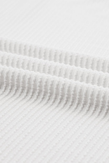 Stylish White Ribbed Knit Top with Quarter Sleeves