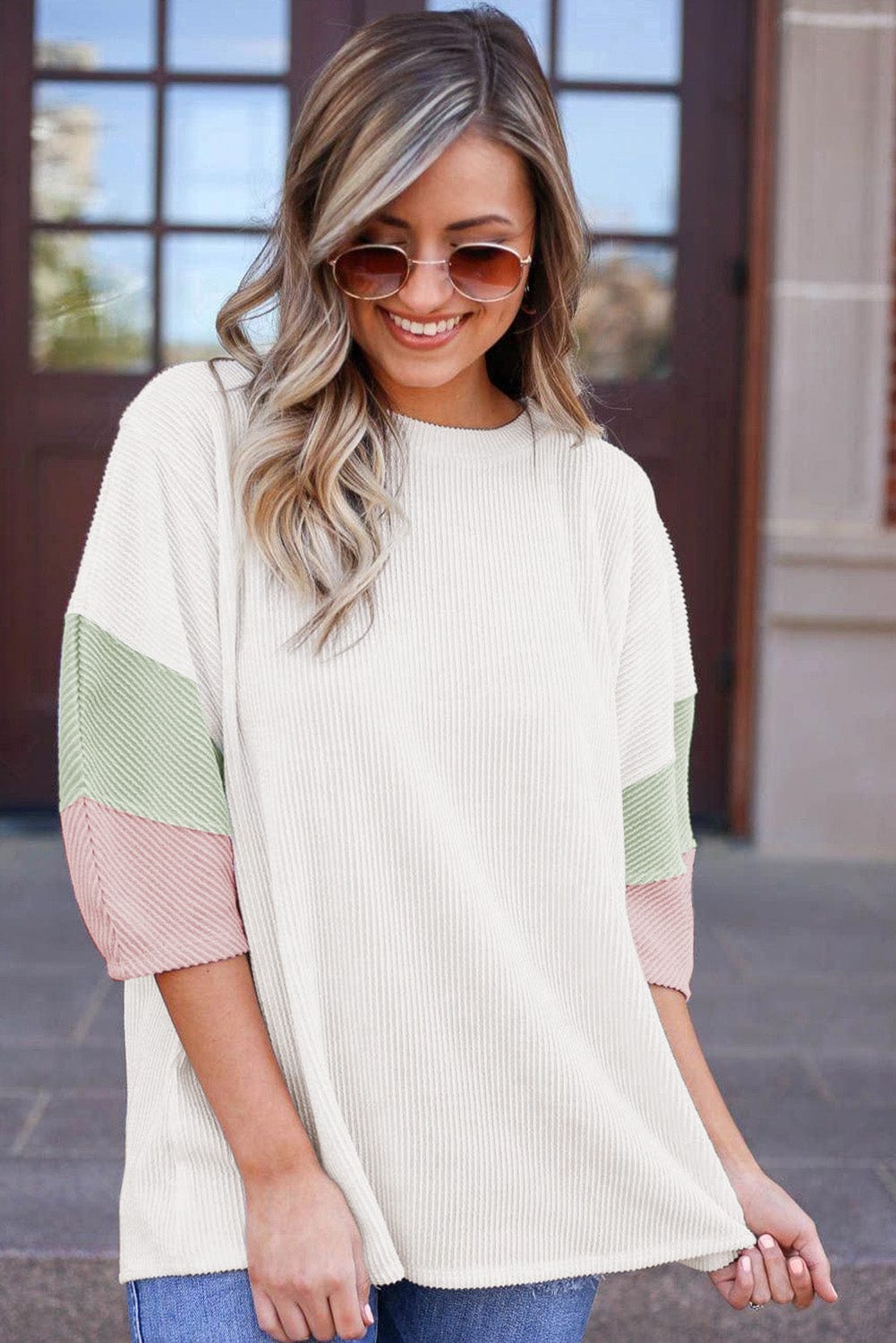 Stylish White Ribbed Knit Top with Quarter Sleeves