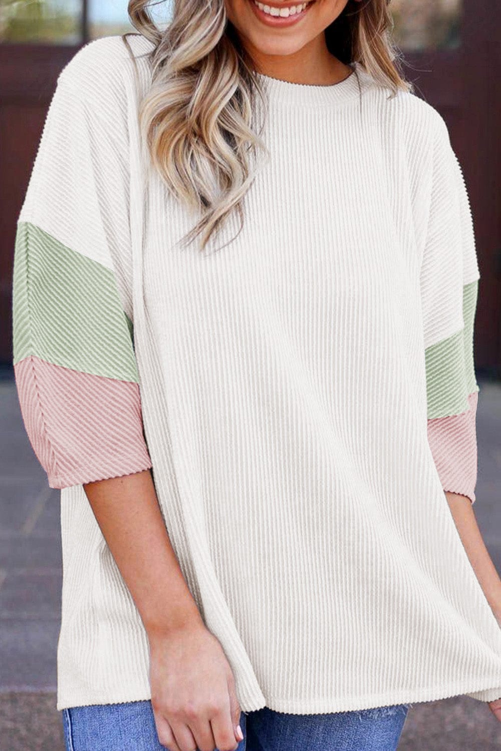 Stylish White Ribbed Knit Top with Quarter Sleeves