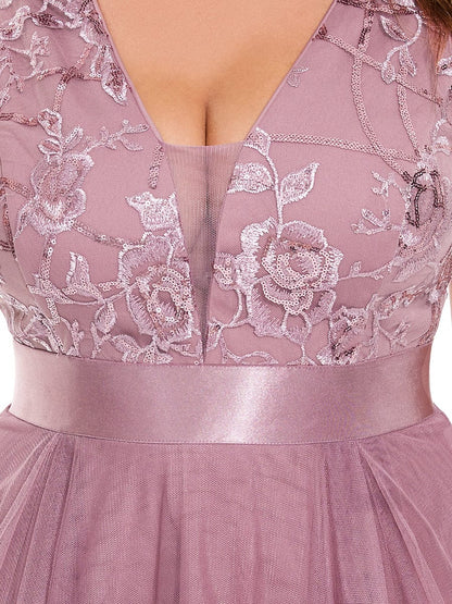 Sultry V-Neck High-Low Tulle Prom Dress with Sequin Detail