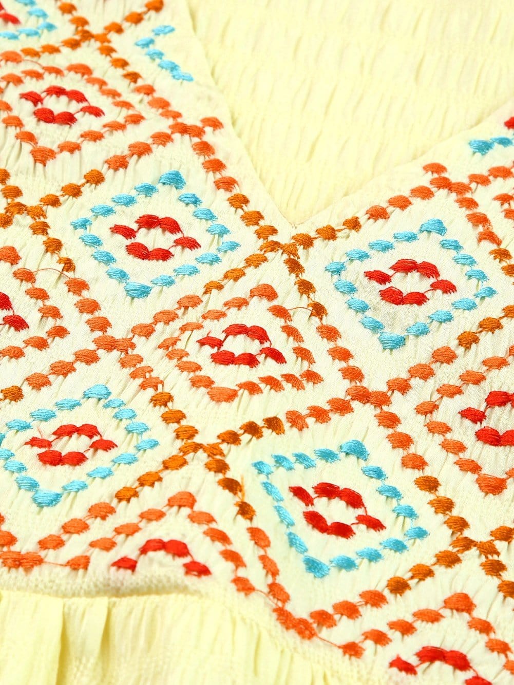 Sunny Yellow Embroidered Ruffle Top with Geometric Details