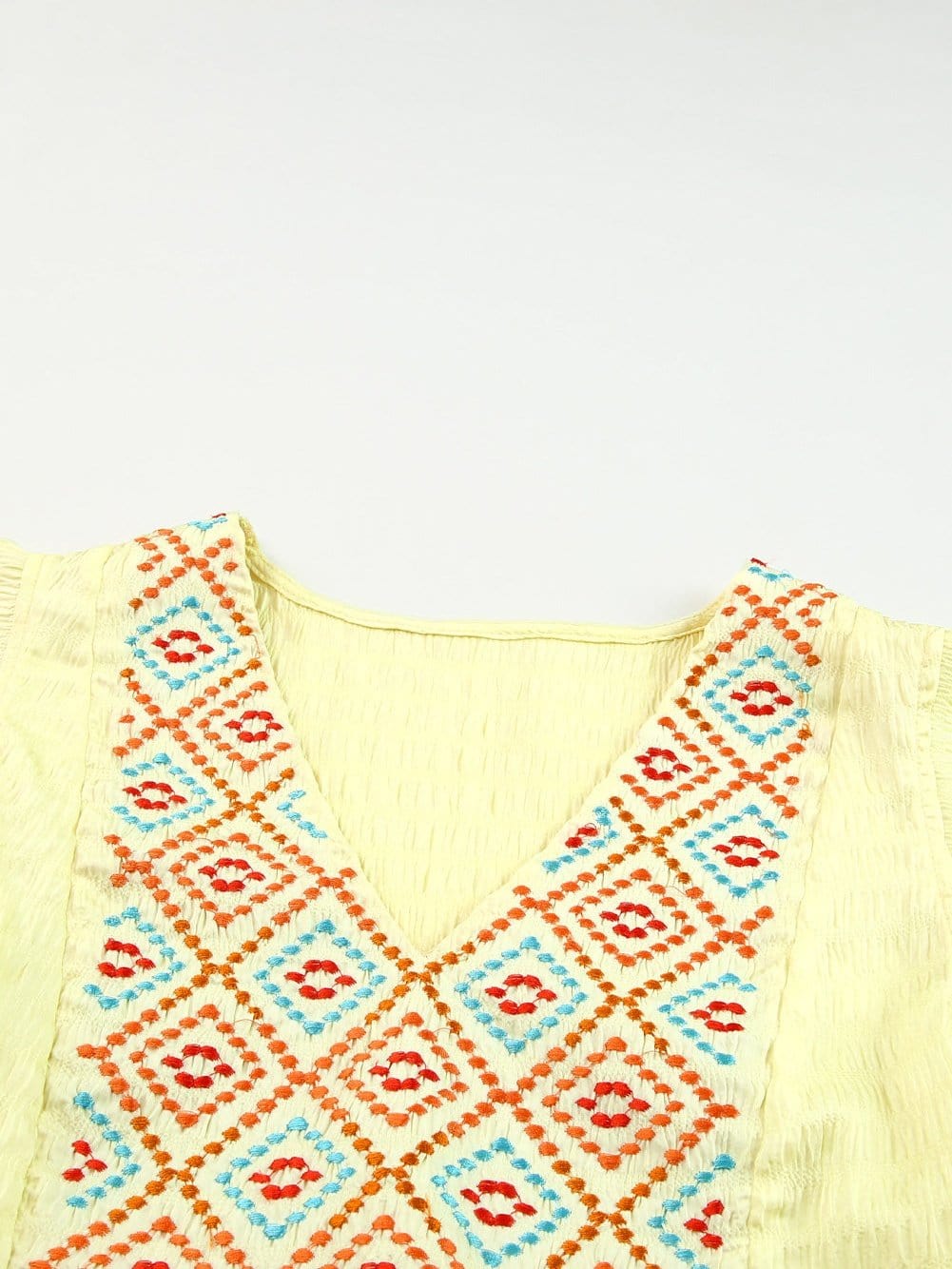 Sunny Yellow Embroidered Ruffle Top with Geometric Details