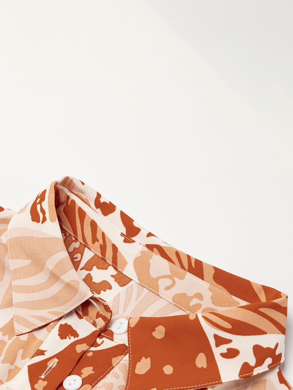 Swing into Style with the Brown Multi Print Dress