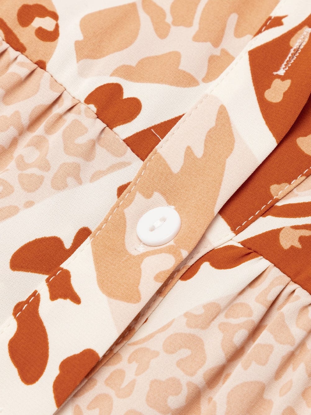 Swing into Style with the Brown Multi Print Dress