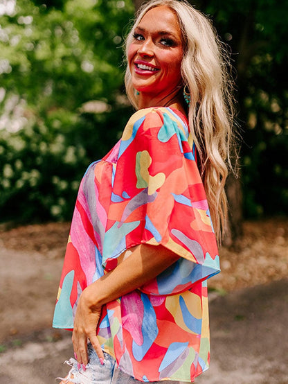 Vibrant Abstract Print Flowy Sleeve Round Neck Top