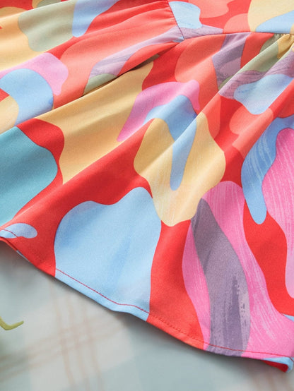 Vibrant Abstract Print Flowy Sleeve Round Neck Top