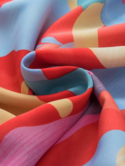 Vibrant Abstract Print Flowy Sleeve Round Neck Top