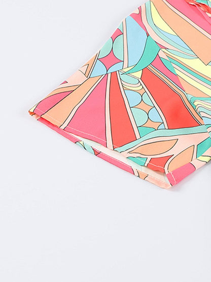 Vibrant Geometric Pattern Flared Dress with Tassel Detail