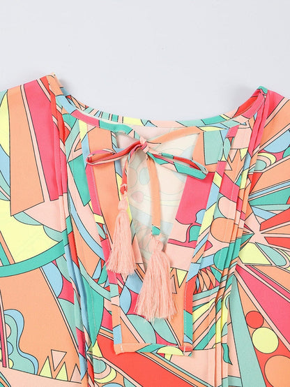 Vibrant Geometric Pattern Flared Dress with Tassel Detail