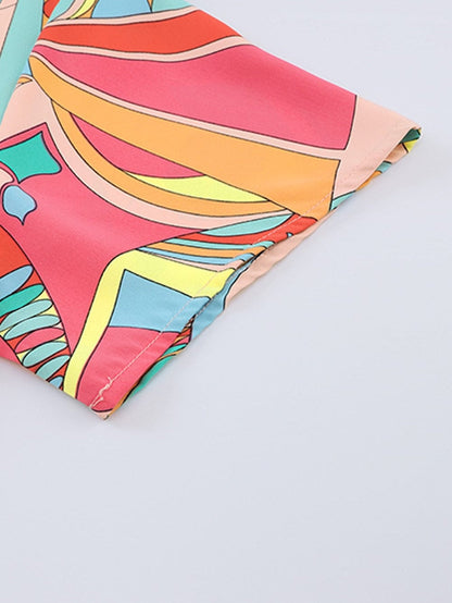 Vibrant Geometric Pattern Flared Dress with Tassel Detail