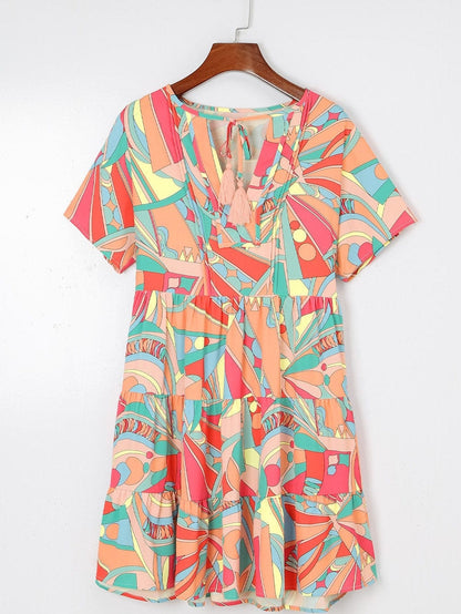 Vibrant Geometric Pattern Flared Dress with Tassel Detail