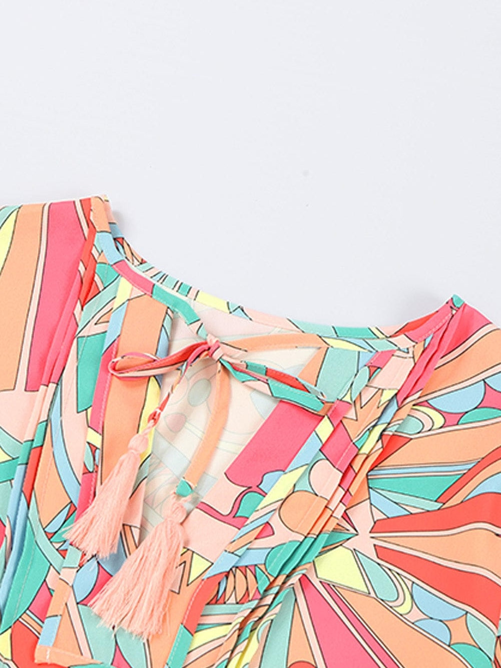 Vibrant Geometric Pattern Flared Dress with Tassel Detail