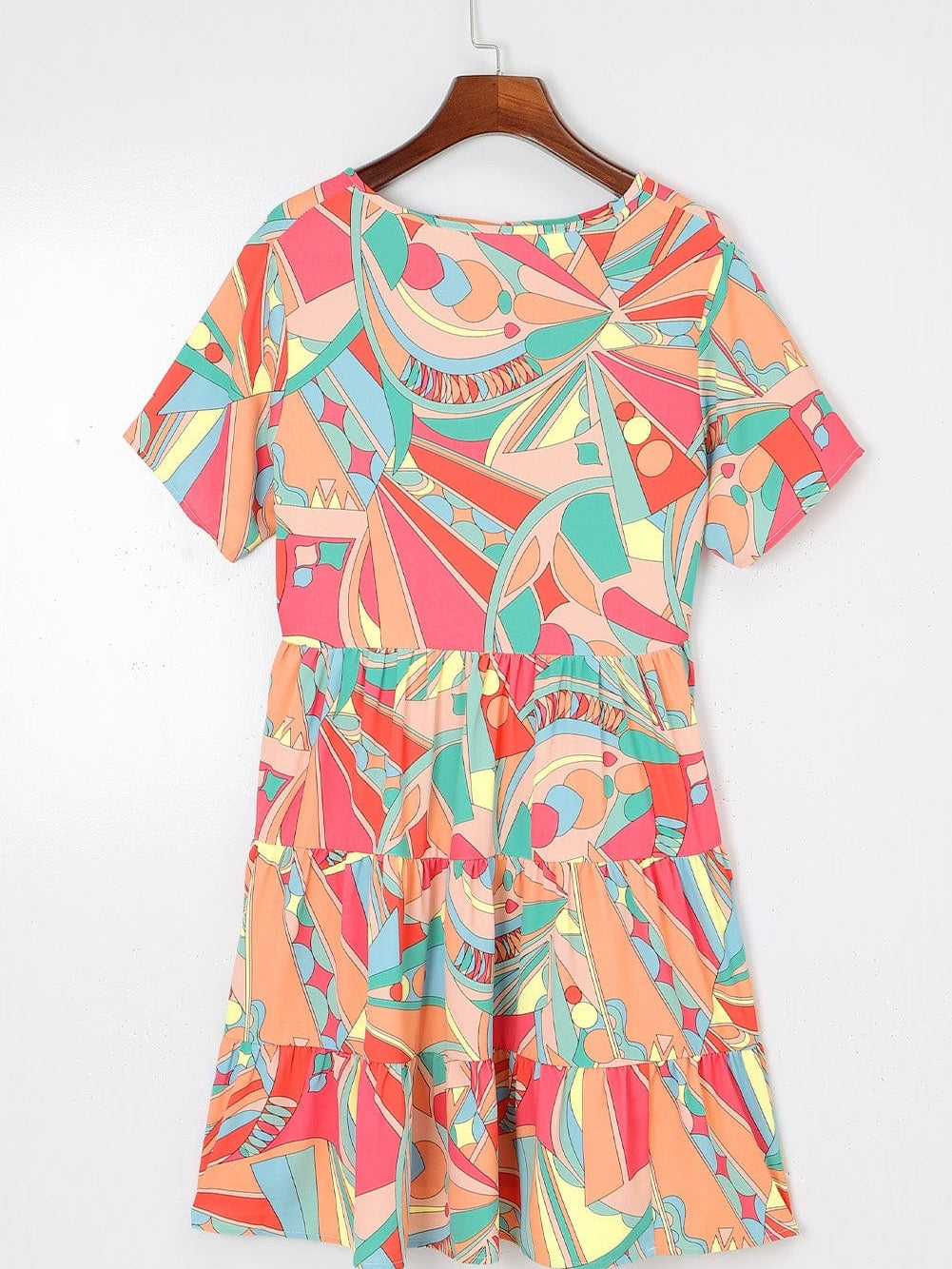 Vibrant Geometric Pattern Flared Dress with Tassel Detail