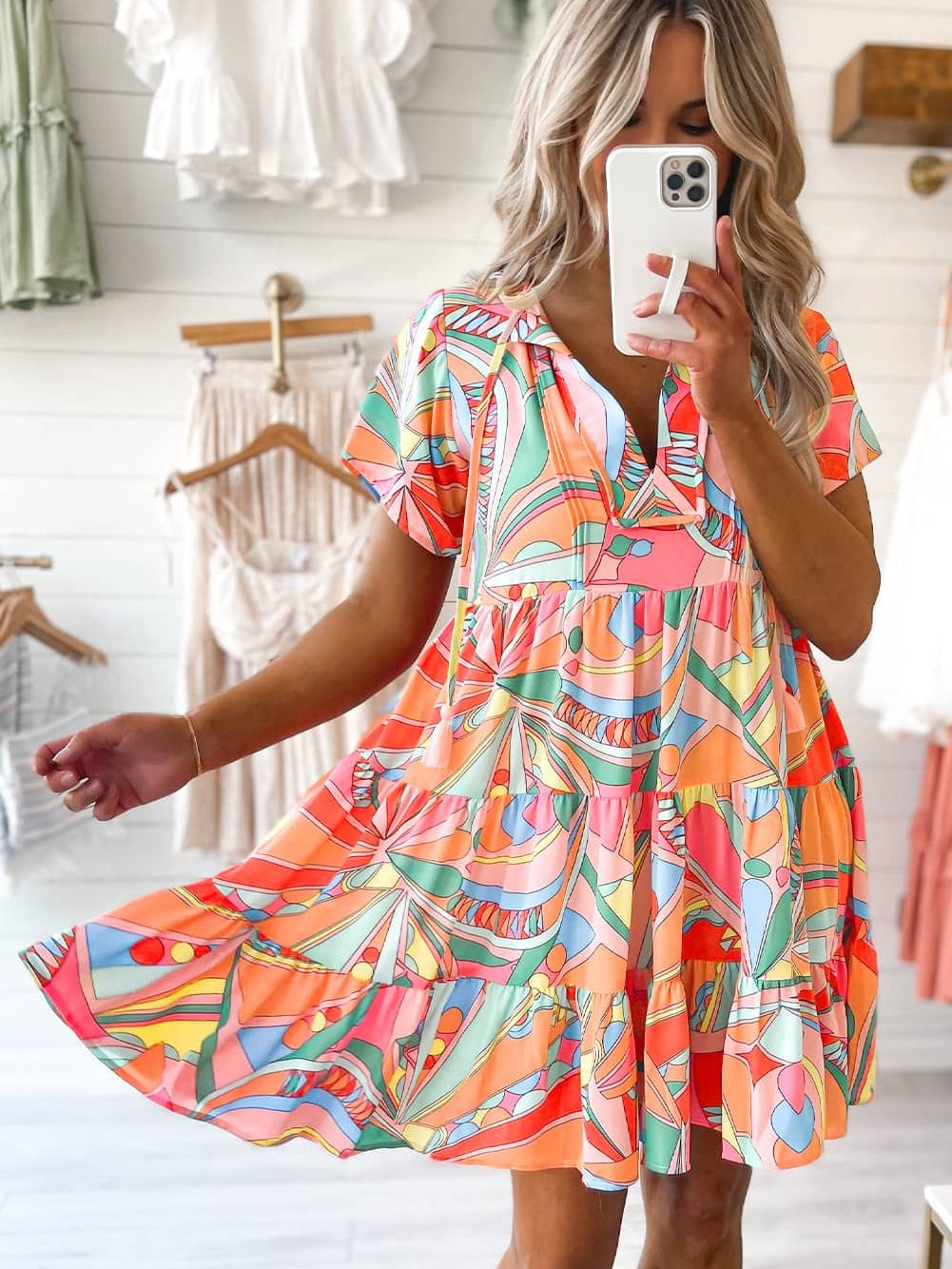 Vibrant Geometric Pattern Flared Dress with Tassel Detail