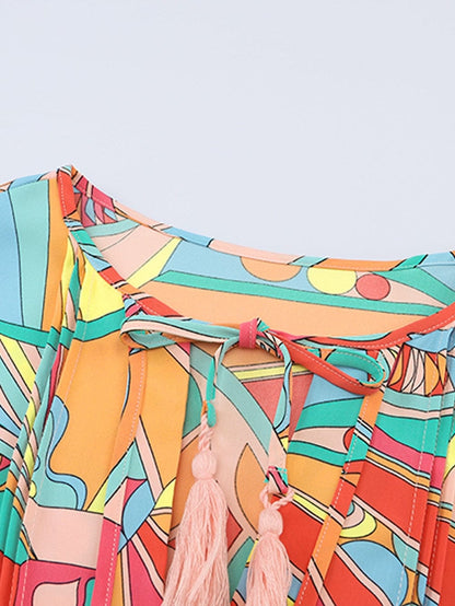 Vibrant Geometric Pattern Flared Dress with Tassel Detail