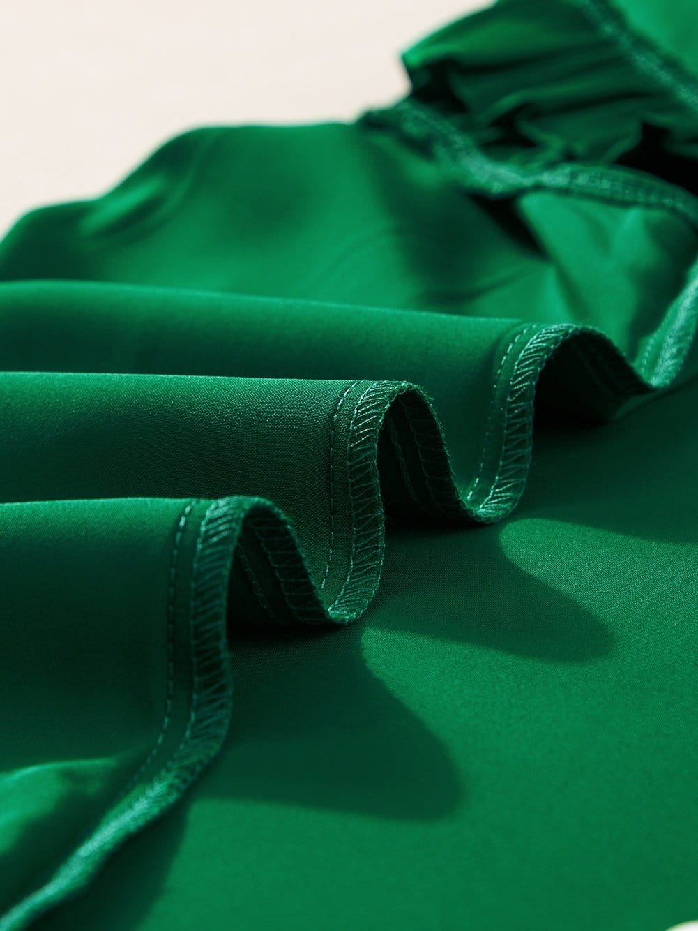 Vibrant Green Pleated Sleeveless Blouse with Frilled Mock Neck