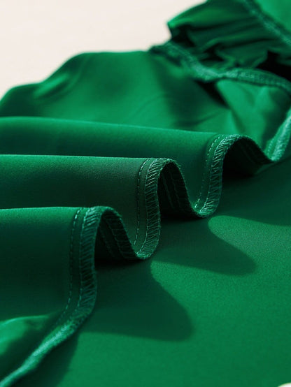 Vibrant Green Pleated Sleeveless Blouse with Frilled Mock Neck