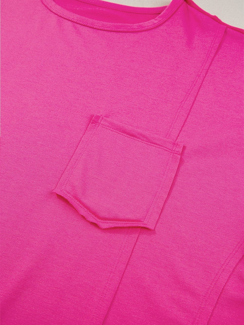 Vibrant Pink Oversized T-shirt with Patched Pocket and Exposed Seam